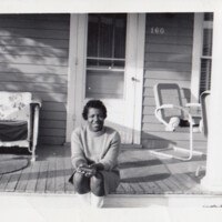 simms00123-young-woman-on-a-porch.jpg